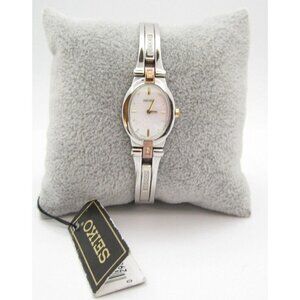 Women Seiko Hardlex Crystals Quartz 16 Diamond Analog Oval Watch (F955)MRSP $395